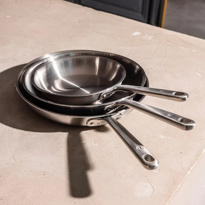 Set de 3 poêles en inox 3-plis Du Bruit dans la Cuisine, finition acier brossé avec manches rivetés